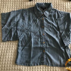 Denim blouse.